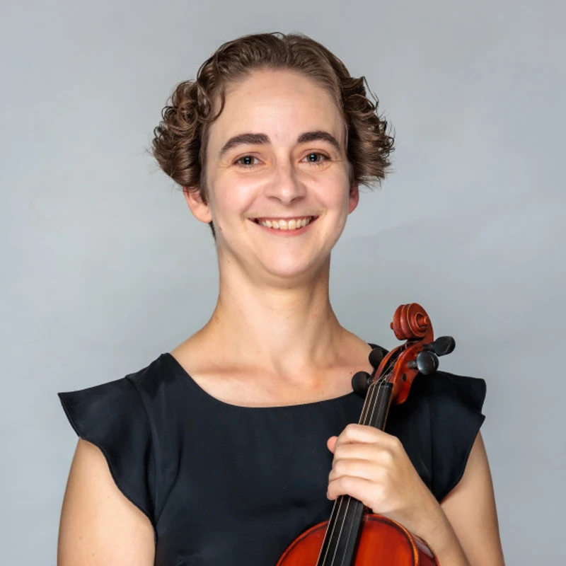 Amy Furfaro holding a violin