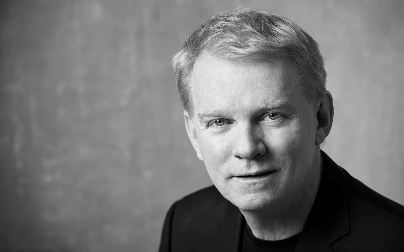 Black and white headshot of Mark Coughlan.