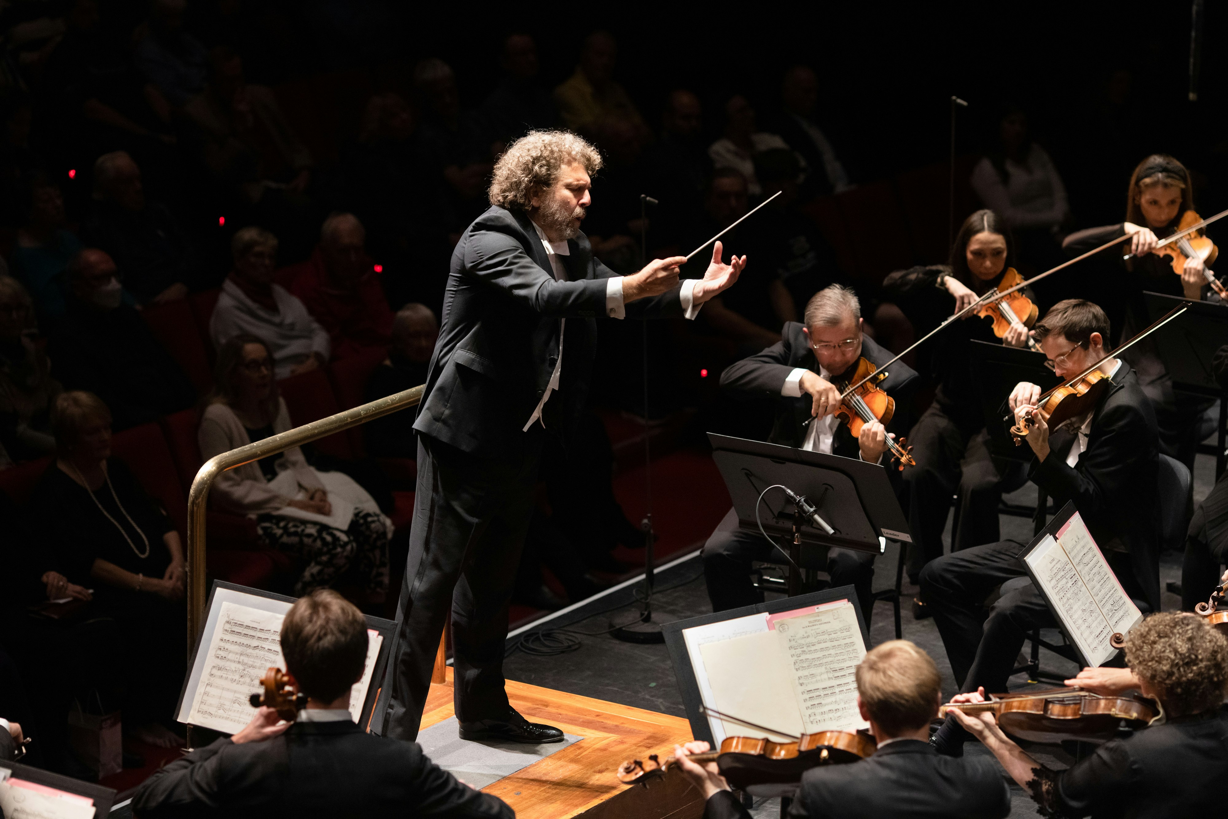 Asher Fisch is in motion conducting WASO