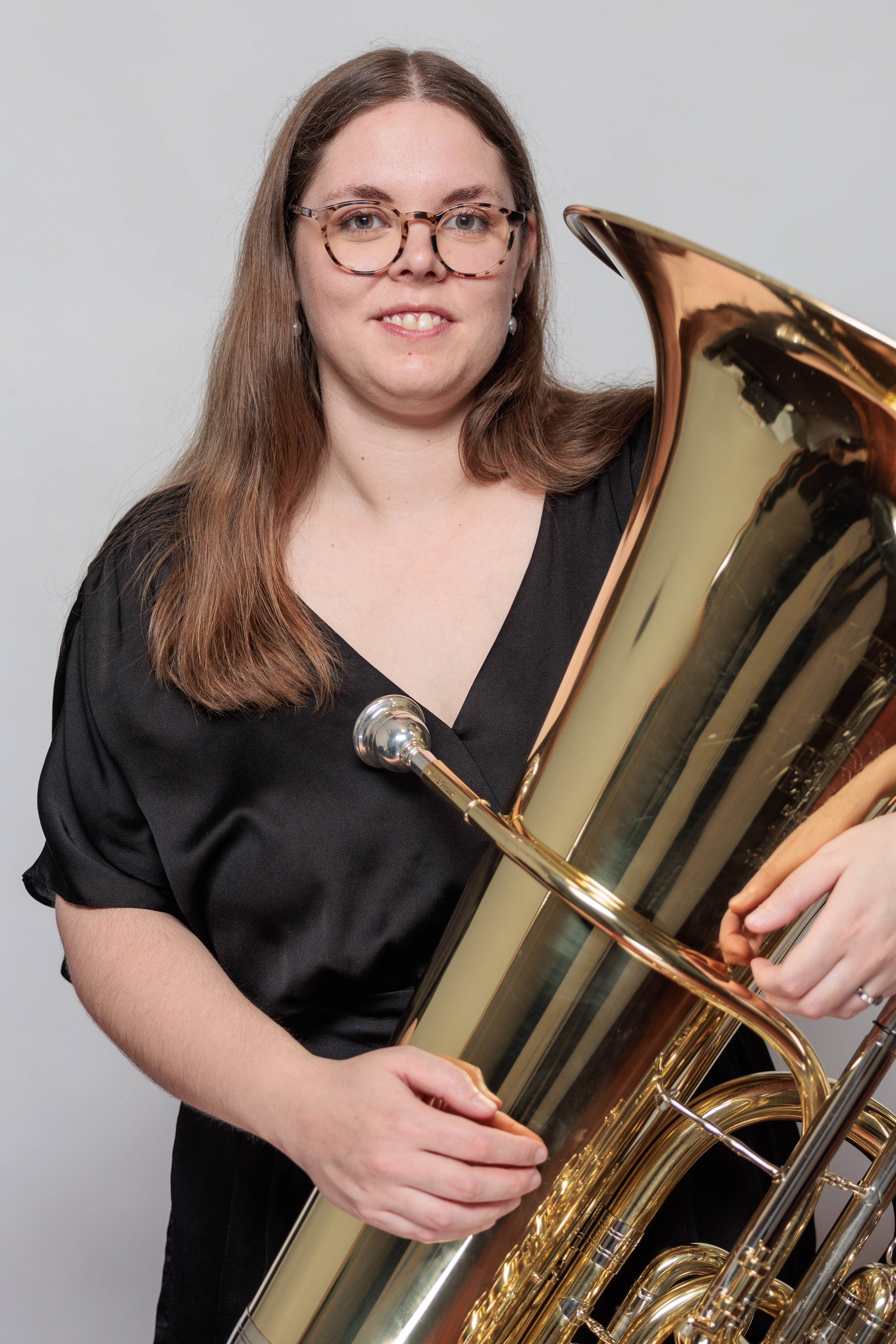 Chloe Higgins holding a tuba