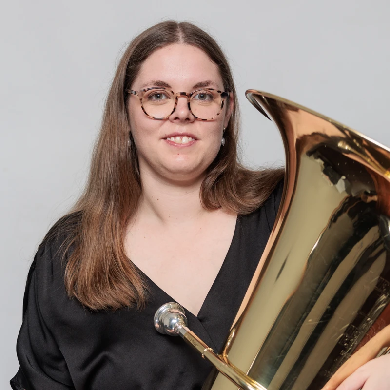 Chloe Higgins holding a tuba