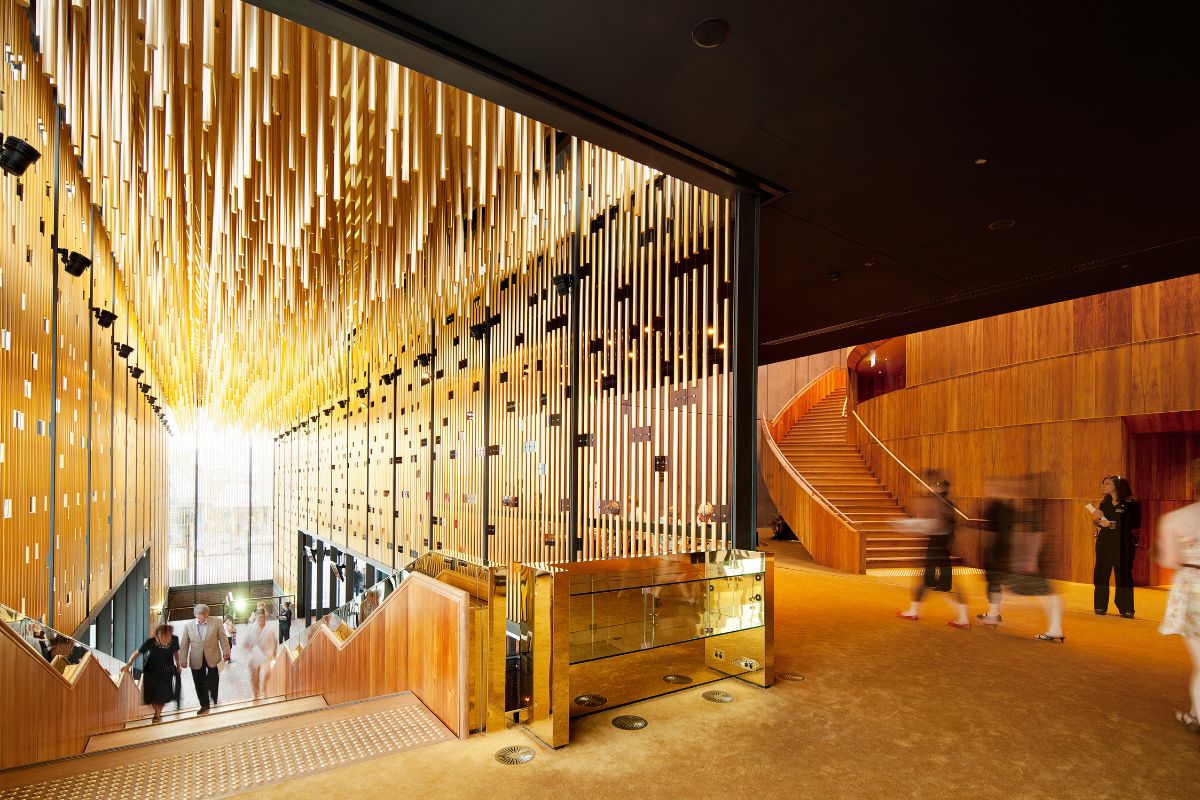 Patrons walking through the upstairs Heath Ledger Theatre foyer at the State Theatre Centre of WA.