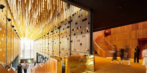 Patrons walking through the upstairs Heath Ledger Theatre foyer at the State Theatre Centre of WA.