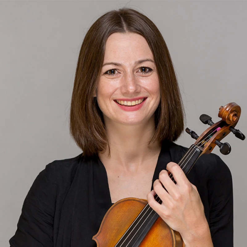 Kate Sullivan holding a violin