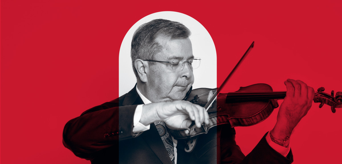Promotional image of a musician playing a violin, with a red overlay to align with the MACA Symphonic Series branding