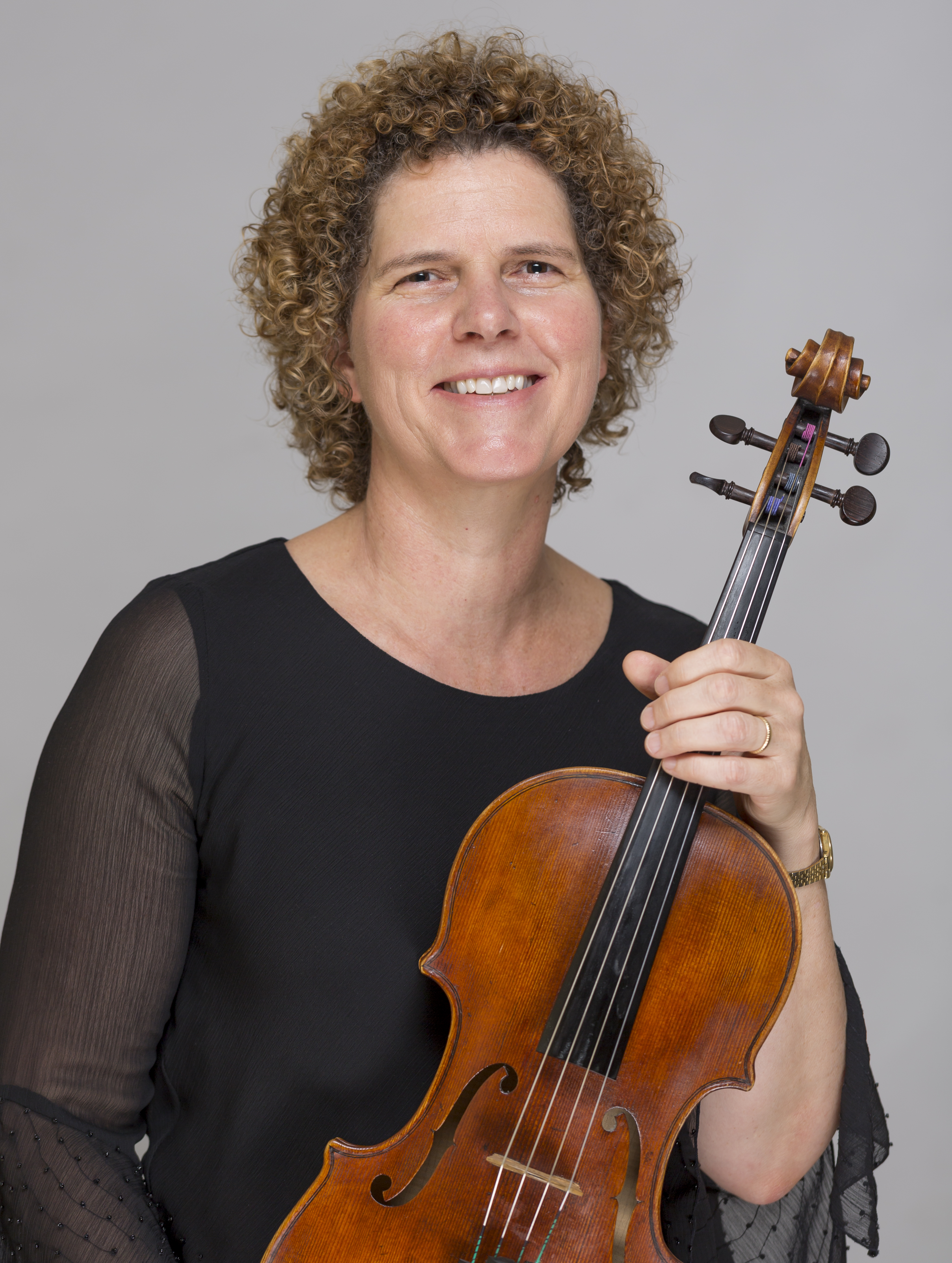 Rachael Kirk holding her viola