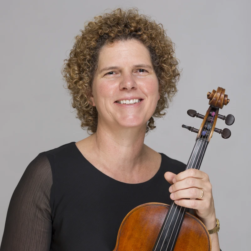 Rachael Kirk holding her viola