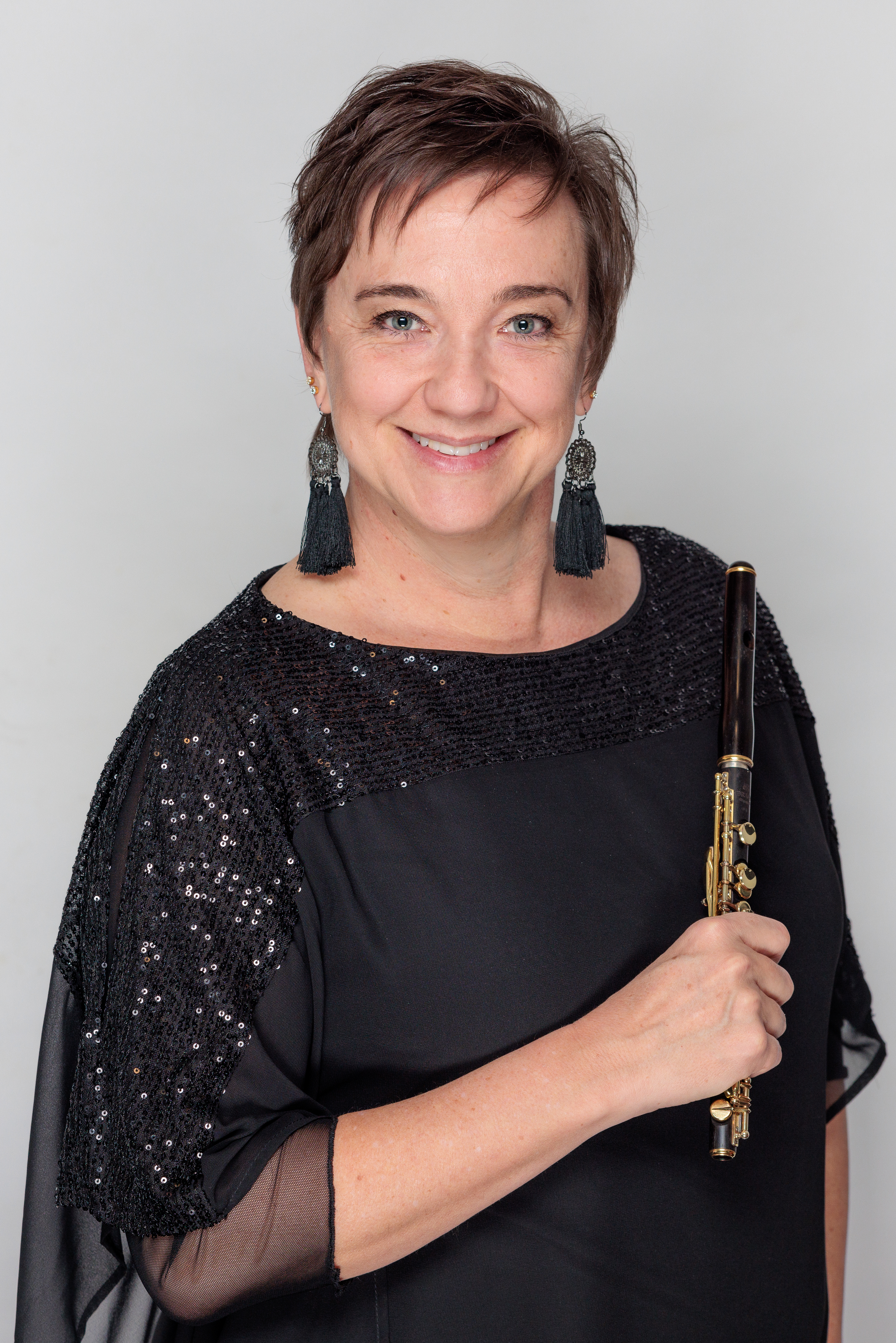 Sonia Croucher holding her piccolo