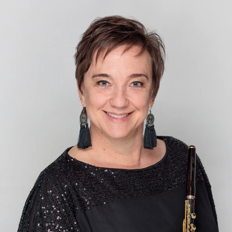 Sonia Croucher holding her piccolo