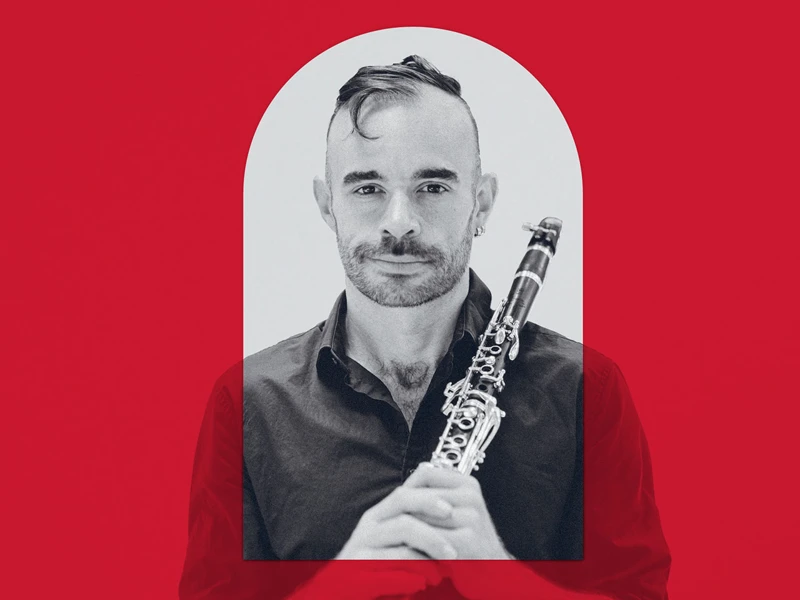 Promotional image of a musician holding a clarinet with a red overlay to align with the branding colour for the MACA Symphonic Series