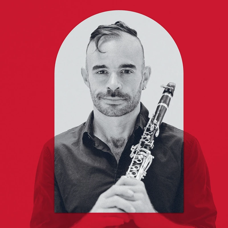 Promotional image of a musician holding a clarinet with a red overlay to align with the branding colour for the MACA Symphonic Series