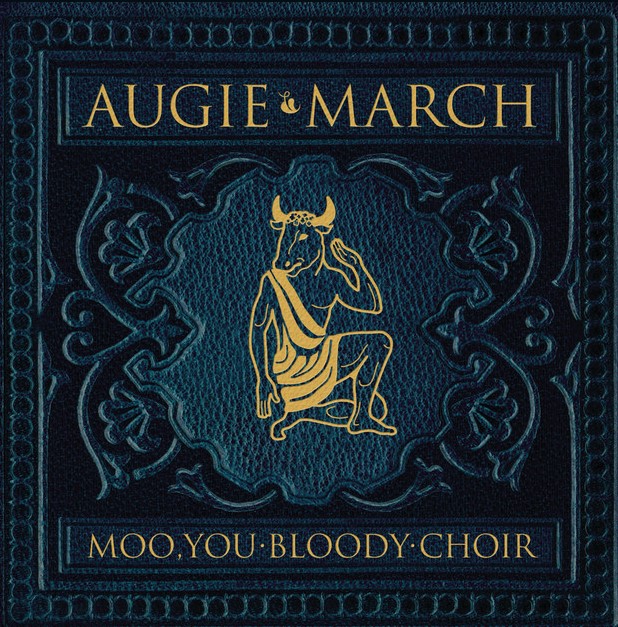 CD cover, Moo You Bloody Cow, blue background with gold illustration of a minotaur in a toga