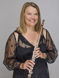 Mary-Anne Blades holding her flute