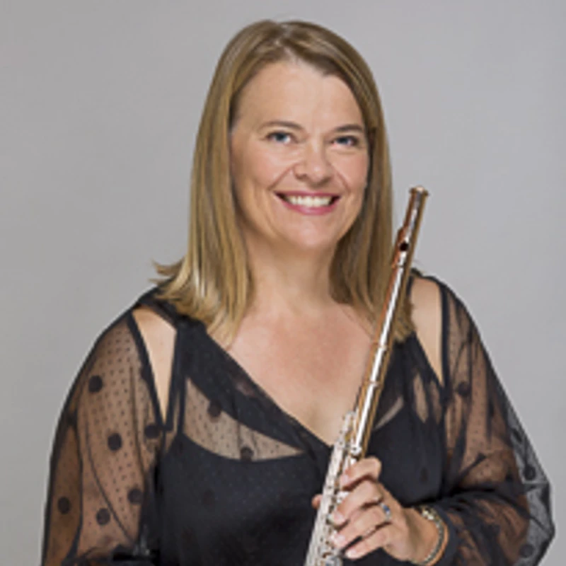 Mary-Anne Blades holding her flute