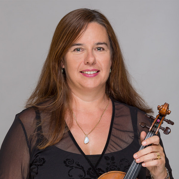 Cerys Tooby holding a violin