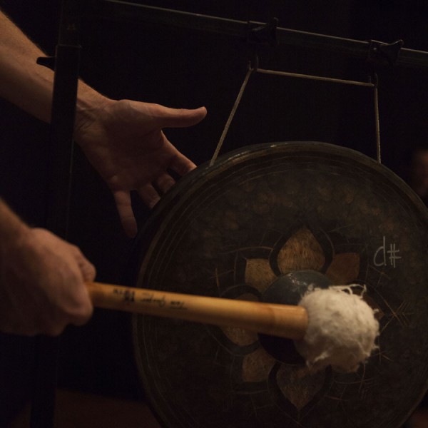 Close up of a gong being hit