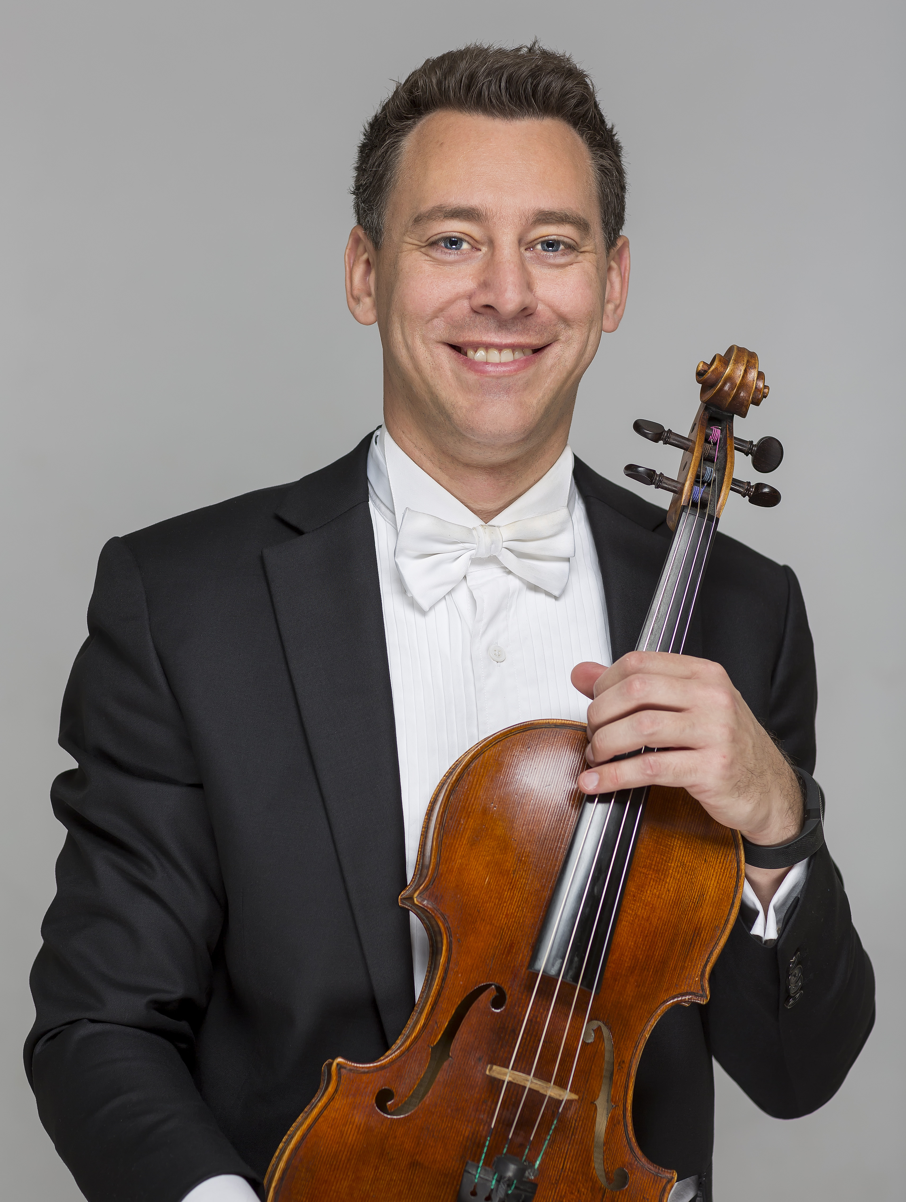 Nik Babic holding his Viola