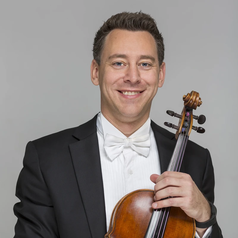 Nik Babic holding his Viola