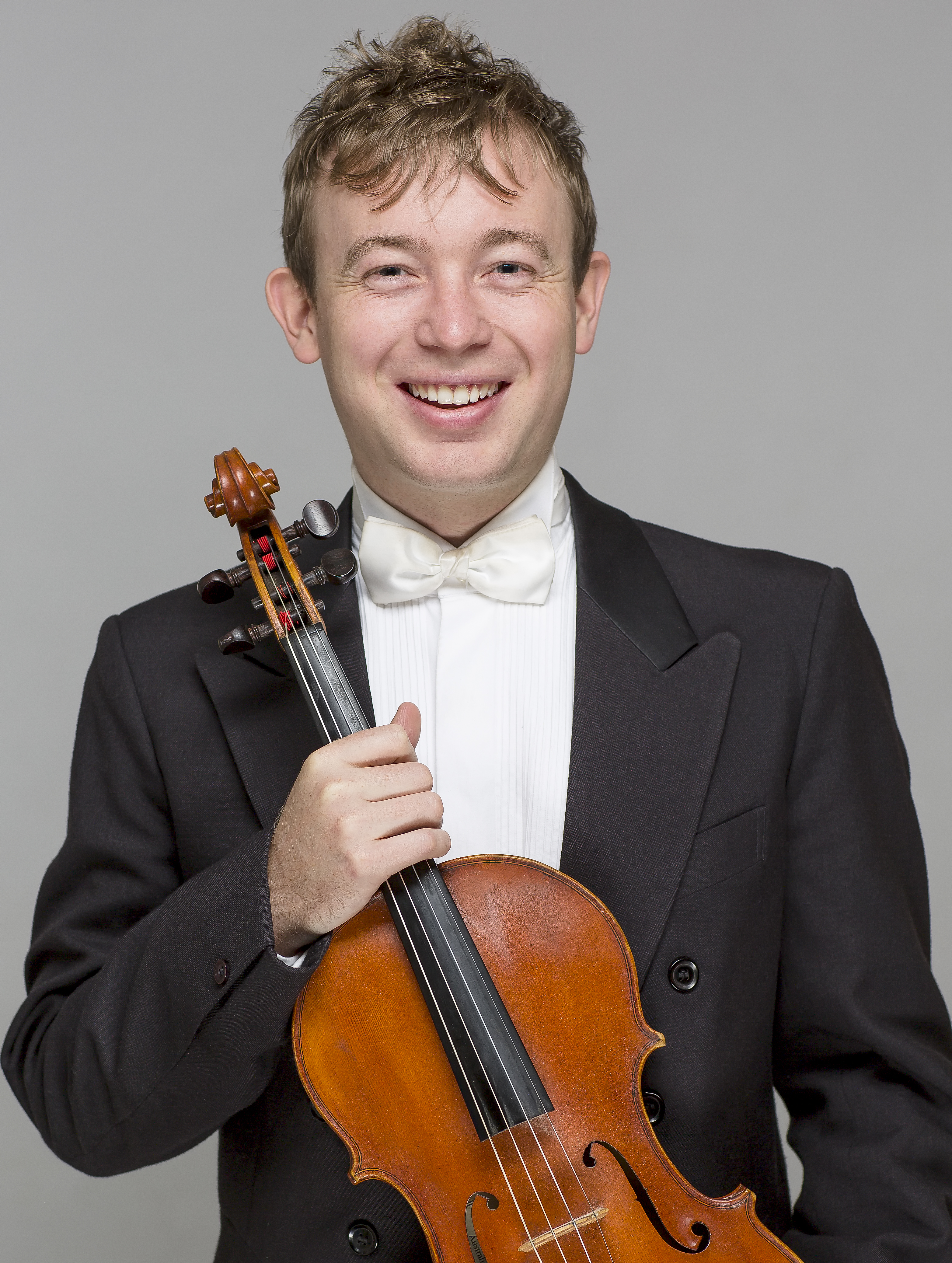 Benjamin Caddy holding viola