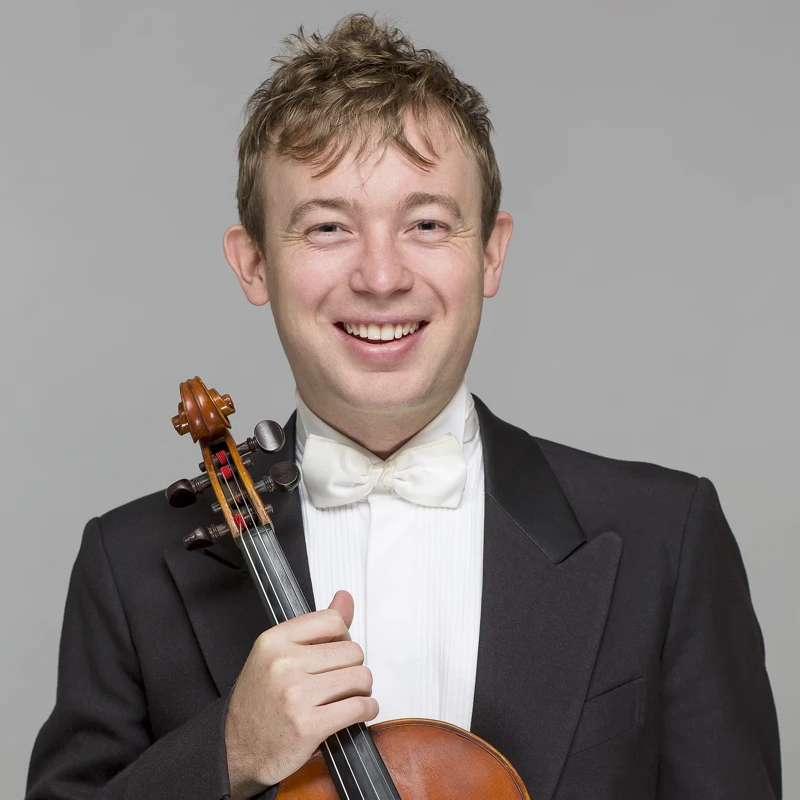 Benjamin Caddy holding viola