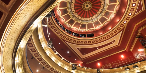 His Majesty's Theatre's ornate red and gold dome ceiling.