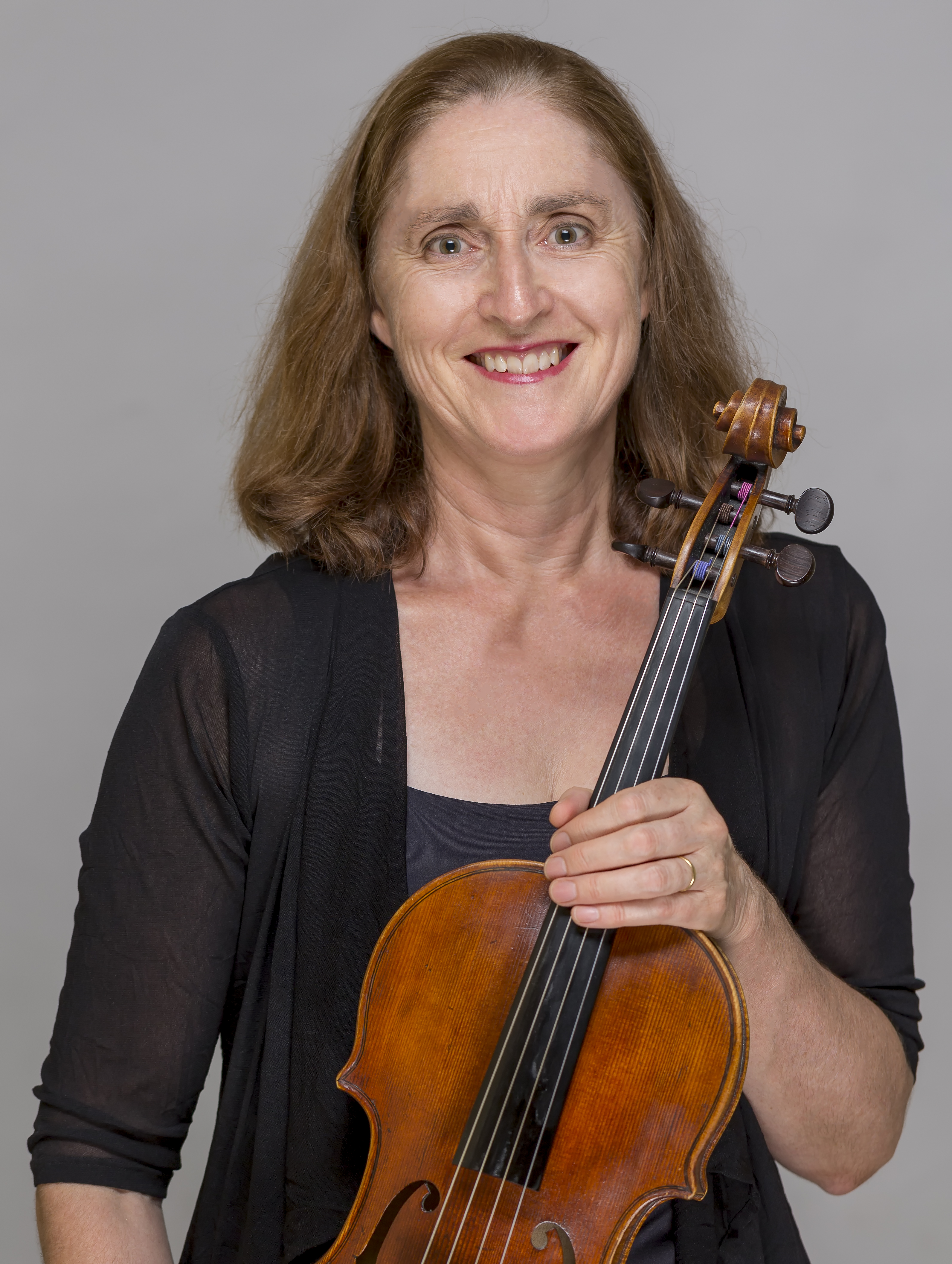 Alison Hall holding viola