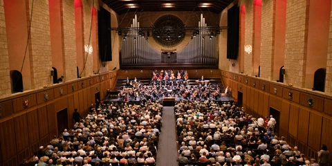 WASO performing on stage to a full audience at Winthrop Hall.