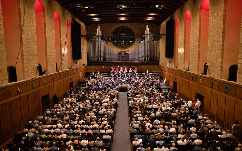 Winthrop Hall WASO performing on stage to a full audience at Winthrop Hall.