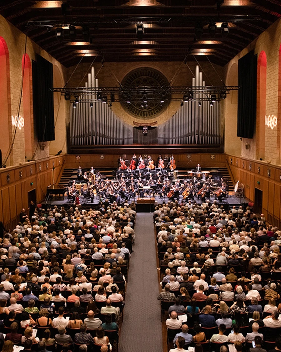 WASO performing on stage to a full audience at Winthrop Hall.