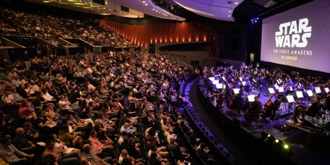 WASO performs the music from Star Wars to a full audience at Riverside Theatre, while the film is projected on a large screen.