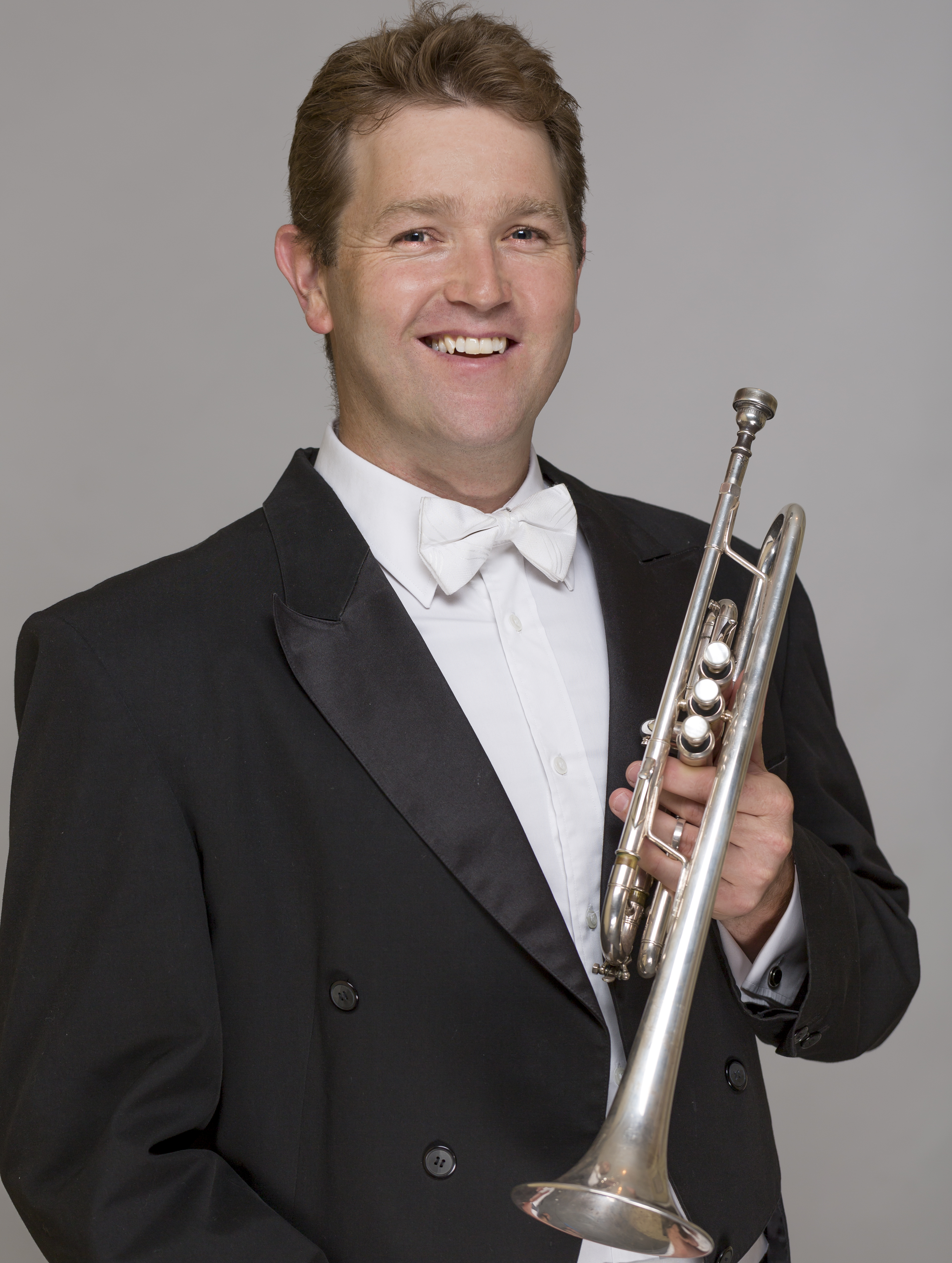 Peter Miller holding his trumpet